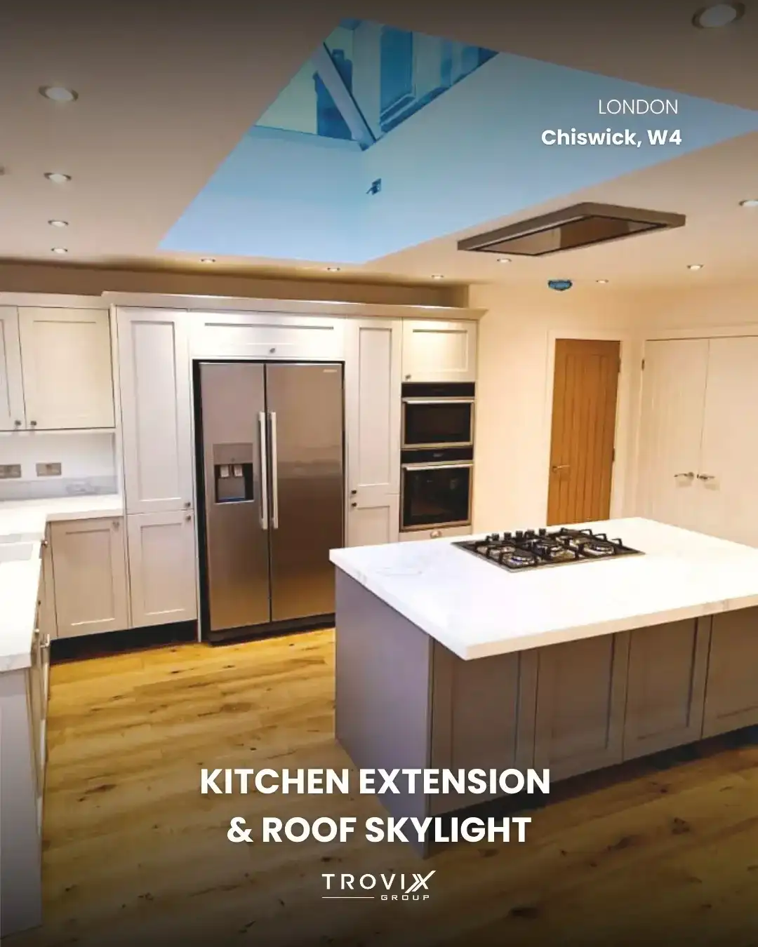 Kitchen extension with island and skylight in Chiswick London